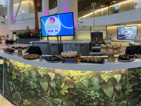 Fête LA Dessert Bar at SoFI Stadium replete with chocolate mouse, lemon tarts, cookies, and brownies.