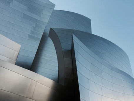 A cropped view of the undulating metal walls of the Walt Disney Concert Hall in Downtown Los Angeles.