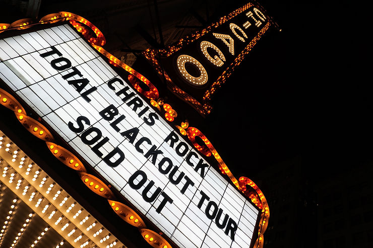 The marquee of the Chicago theater advertising that Chris Rock's Total Blackout Tour is sold out.