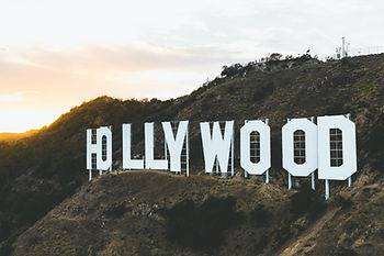 Hollywood Sign perched in the Hollywood hills at sunset.