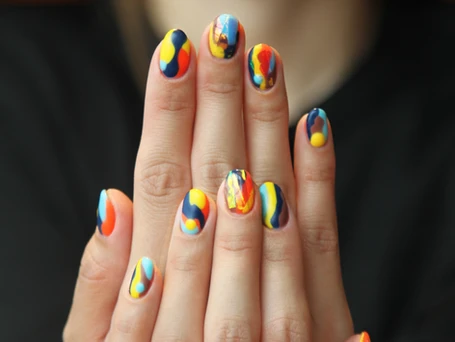 Multi-colored swirls painted nails