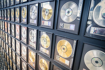 A wall of platinum records.