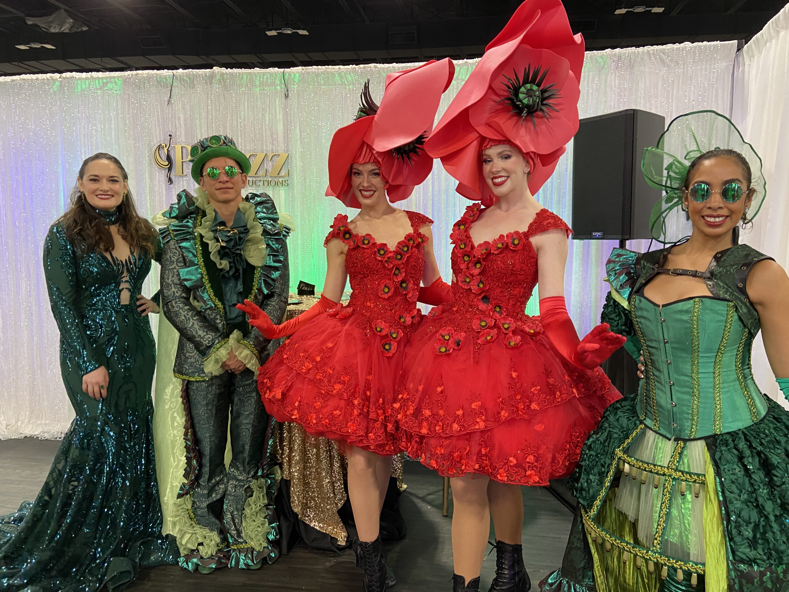 People dressed up looking like flowers and moss at the Catersouce + The Special Event 2025 trade show.