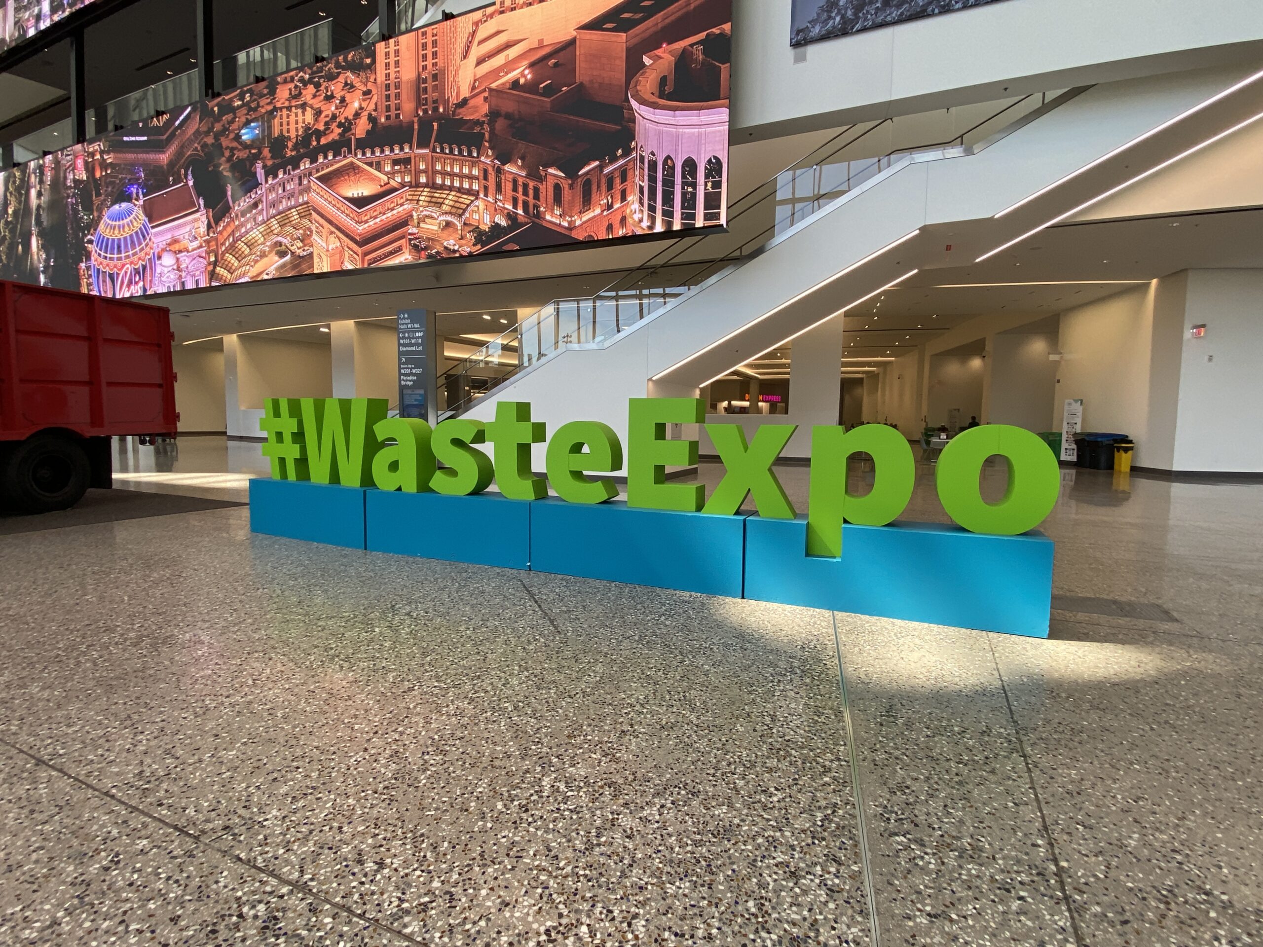 #WasteExpo sign in blue and green at the trade show in Las Vegas at the Convention Center.